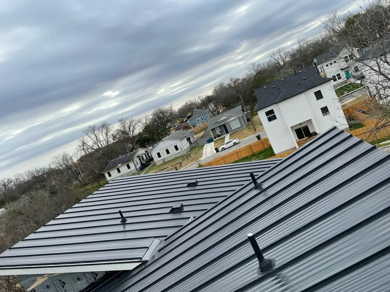 Standing seam metal roof panels with vents for Skylight Repair in Newark